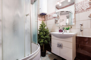 modern bathroom room with toilet and washing machine