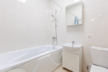 modern bathroom room with toilet and washing machine