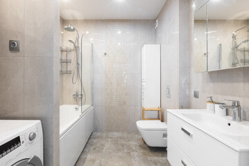 modern bathroom room with toilet and washing machine