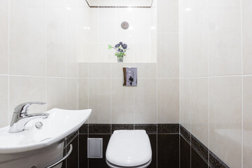 modern bathroom room with toilet and washing machine