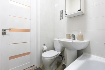 modern bathroom room with toilet and washing machine