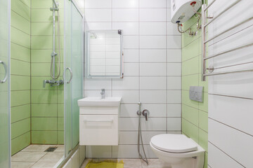 modern bathroom room with toilet and washing machine