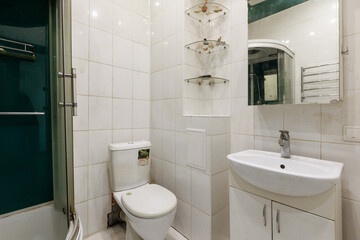 modern bathroom room with toilet and washing machine