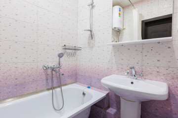 modern bathroom room with toilet and washing machine