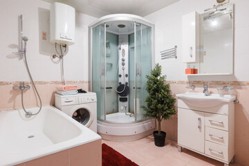 modern bathroom room with toilet and washing machine