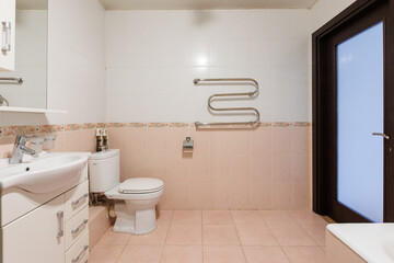 modern bathroom room with toilet and washing machine
