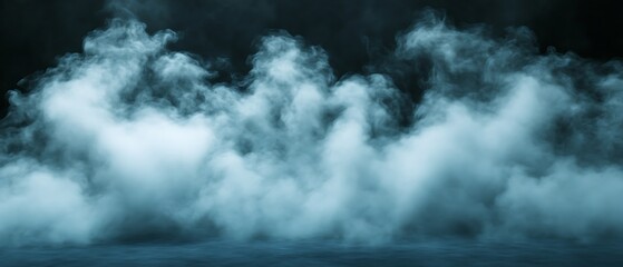 Obraz premium Blue smoke clouds on dark background. (1)