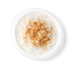 Delicious rice pudding with cinnamon isolated on white, top view