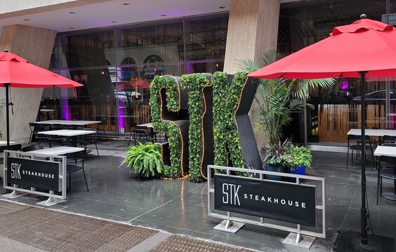 STK Stakehouse, 1114 6th Ave, NYC, USA, is a unique concept that artfully blends modern steakhouse and a chic lounge, offering a dynamic, fine dining experience. Photograph by Artist Nadia Russ. 