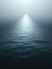 Obraz premium Serene ocean scene at dawn with light reflecting on water.