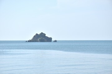 landscape of little island and sea on sunny day at Mae pim cape beach travel location in Thailand   