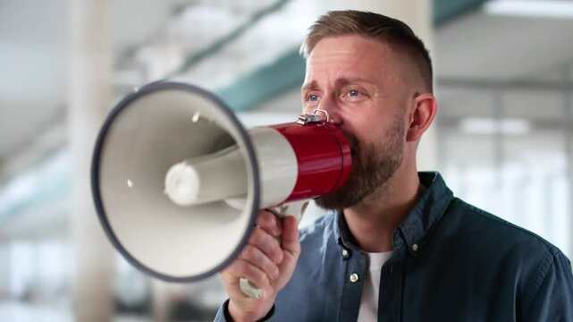 Man Making Megaphone Announcement