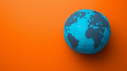 Fototapeta premium Blue Globe Wrapped in Plastic on Bright Orange Background Conceptual Photography