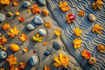 Grey stones, autumn leaves, a drone's view, wavy sand.