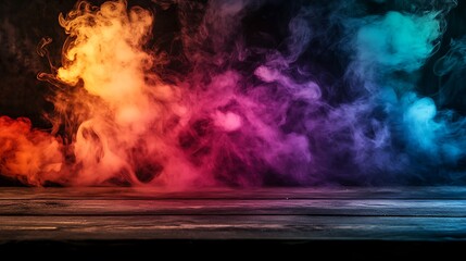 Colorful smoke swirls above dark wooden surface.
