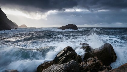 Fototapeta premium rough sea crashing against rocks