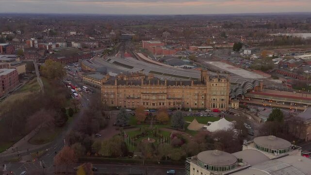 Drone shot of York Railway station and surrounding buildings at dusk in England, UK