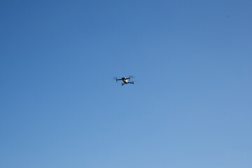 Fototapeta premium Drone takeoff experiment in city park