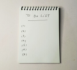 To do list on white paper, Hand written numbers 1 to 7. White background