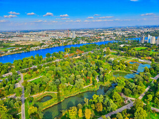 Vienna aerial view in Austria is one of the most famous capital cities of Europe. Danube River, the historic city centre feat. Old buildings around the downtown. Donaustadt, Danube City a modern centr