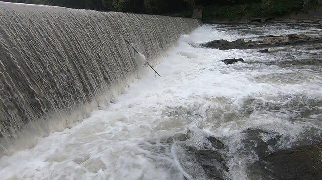weir on the river in the city Malang Jawa