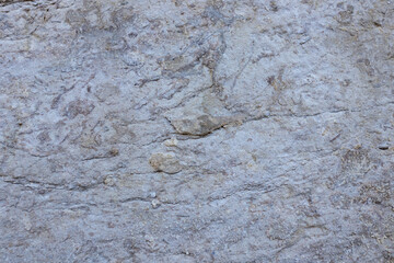 the structure of the surface of natural stone in the canyon of mountain rocks and other stone surfaces in mountainous areas