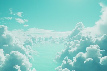  Breathtaking aerial view of fluffy white clouds against a vibrant teal sky, creating a dreamy and peaceful atmosphere