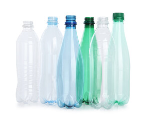Many empty plastic bottles isolated on white