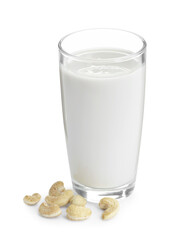 Fresh cashew milk in glass and nuts isolated on white