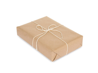 One parcel box wrapped in paper isolated on white