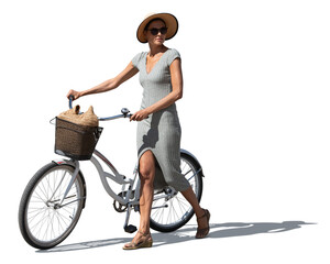 Backlit woman with a dress and a hat walking with a city bike isolated on white background