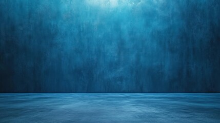 Empty studio room with deep blue textured walls and a smooth floor.