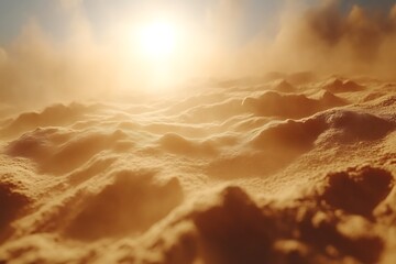 Sunlit, hazy, textured sand dunes.