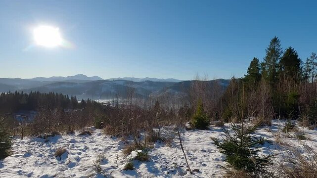 View from Bryzgalky hill above Nova Bystrica village in Slovakia during winter day with clear sky