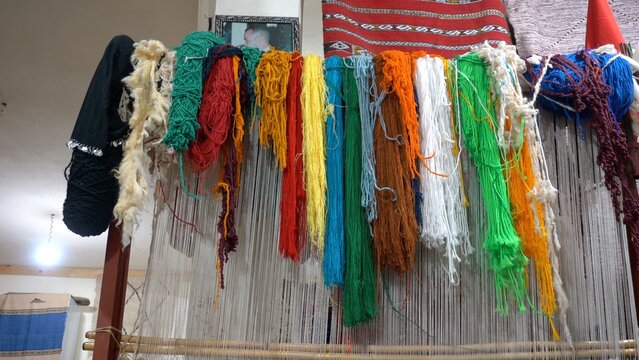 wool threads for the production of handcrafted carpets and typical Moroccan artefacts hung to dry after dyeing with various colors tenneries 