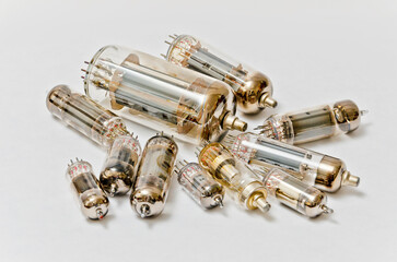 old radio tubes on white background