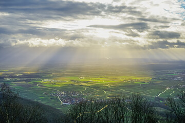 Filtering sunlight over Alsace planis, France