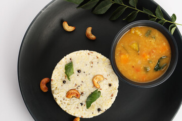 Ven Pongal with Sambar, coconut Chutney popular Indian breakfast food Tamil Nadu festival Pongal Sankranti Diwali spicy pongal