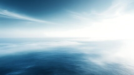 Obraz premium Serene seascape with ethereal clouds and sunlight.