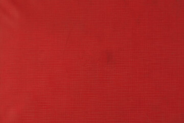 Red cardboard background texture. close up, top view