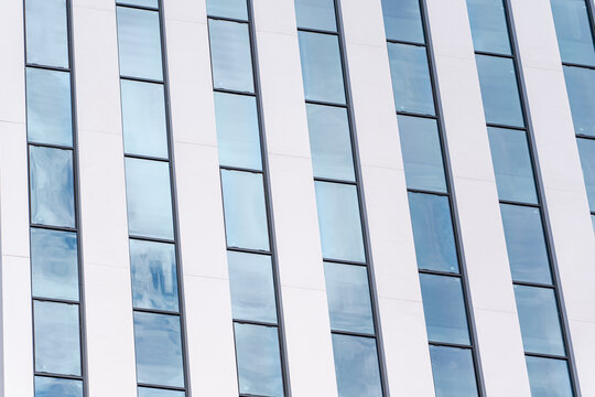 Close-up of a modern building's geometric window facade