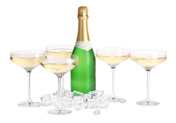 Bottle and glasses of champagne with ice cubes isolated on white