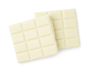 Pieces of delicious white chocolate isolated on white, top view