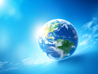 Fototapeta premium Beautiful Earth globe on a blue background with clouds, symbolizing nature and climate.