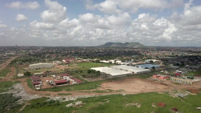 Low angle aerial view passing over the city of Juba, capital of South Sudan.