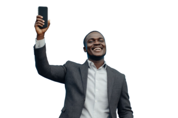 Happy excited sucessful modern man holding phone and raising arm up to celebrate achievement, isolated on PNG