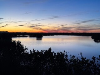 Obraz premium sunset over the river