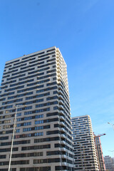 Naklejka premium modern new buildings, apartment buildings and offices in the city, skyscrapers