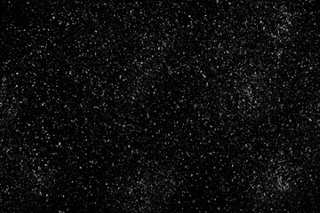 Sea ​​salt grains, crystals scattered isolated on black, texture