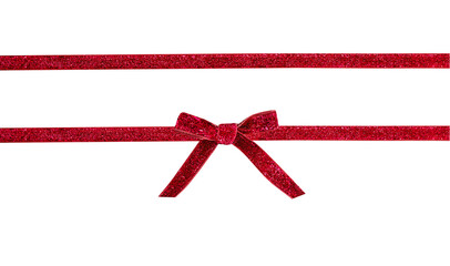 Red glitter bow and ribbon isolated on white. Gift box decor, Christmas design element. Wrap...